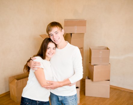 Careful loading of household items into a removal van for a local West London move